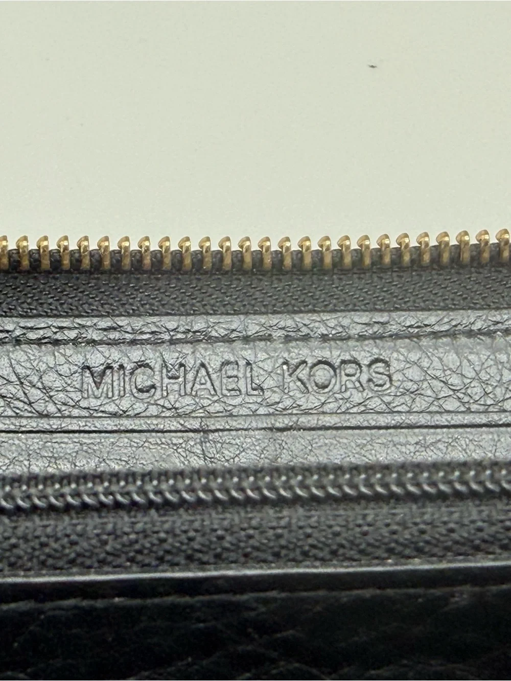 Michael Kors Black Pebbled Leather Zip Around Continental Wallet Logo Plaque